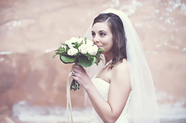 happy bride holding bouquet of flowers - wedding photo by top Rome based destination wedding photographer Rochelle Cheever, Rome Weddings Photography